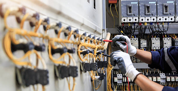 Professional Electrician technician working in Fox Farm-College, WY